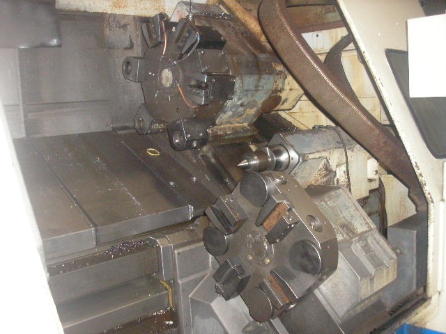 http://www.machinetools247.com/images/machines/12713-Okuma LC-40M 2SC 9.jpg